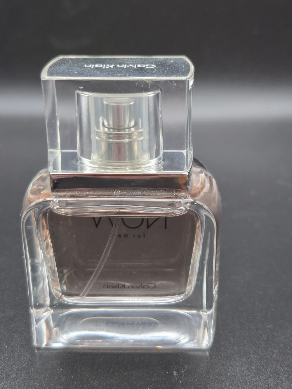 Calvin Klein Eternity Now for Men - Clear Glass Bottle with Pale Amber Liquid